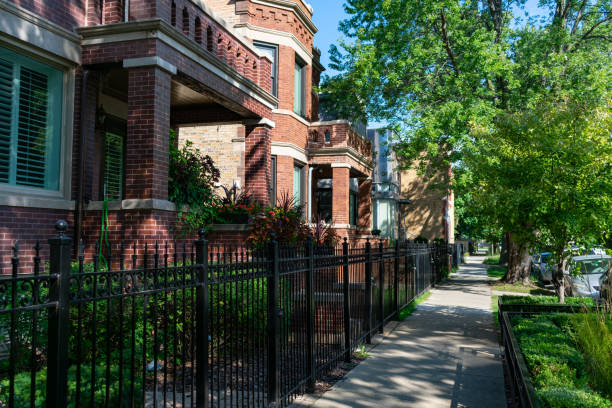 A row of old brick houses line a neighborhood street in Chicago’s Bucktown neighborhood. A row of old brick houses line a neighborhood street in Chicago’s Bucktown neighborhood.