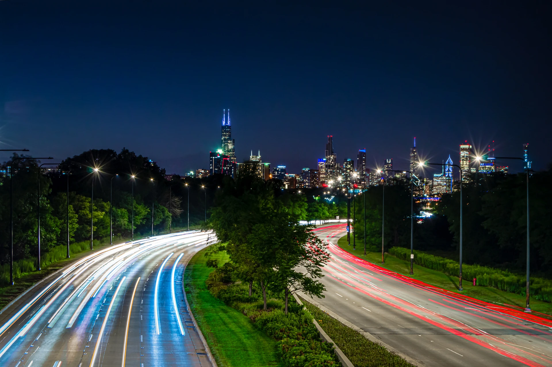 Lights in the city at night. Skyline and traffic on the streets of Chicago, Illinois.